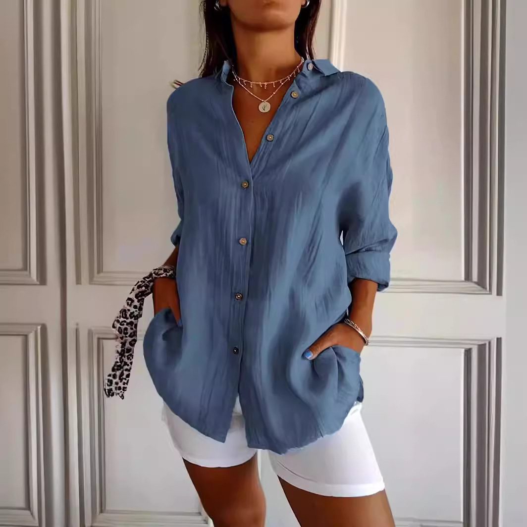 قميص نسائي بأكمام طويلة وياقة (Lapel)، إغلاق بأزرار أمامية (Single-breasted)، تصميم بطيّات (Pleated)، بلوزة علوية أنيقة، ملابس نسائية عصرية ومناسبة للإطلالة الكاجوال أو الرسمية الخفيفة. - الصورة 2