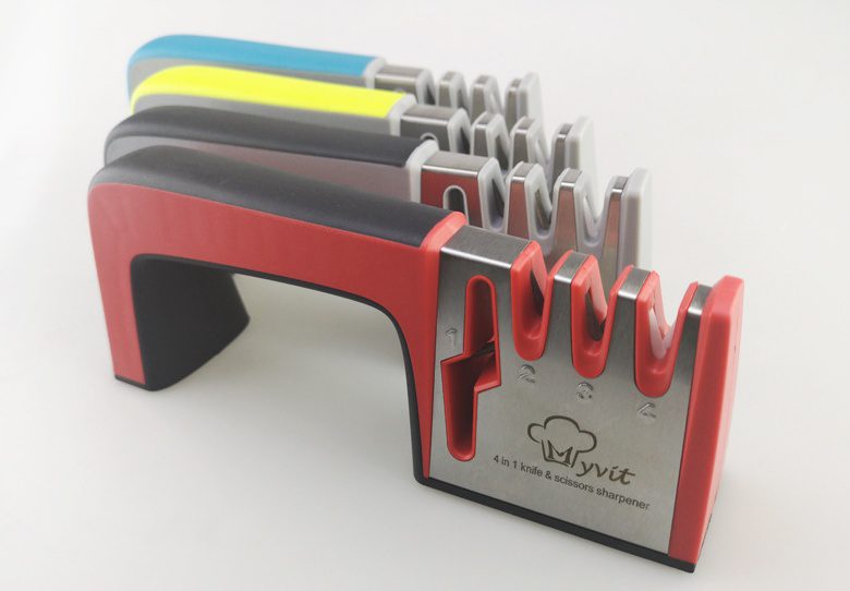 A Four-in-one Family Uses A Sharpener To Sharpen A Kitchen Knife - Image 5