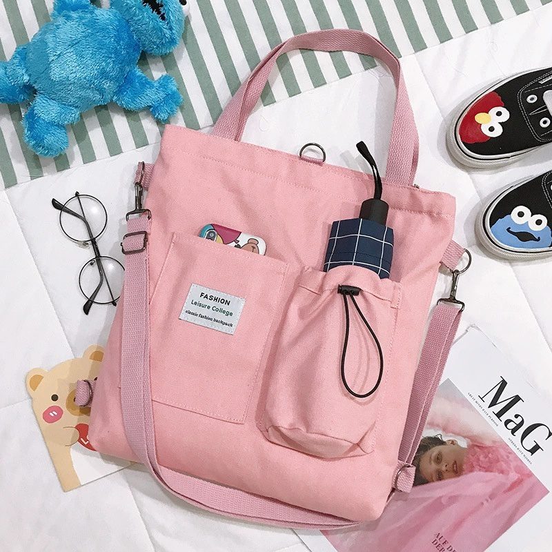 حقيبة يد قماشية بنمط "هاراجوكو" للطلاب مزودة بجيوب، مناسبة للطراز الأكاديمي (Preppy Style)، وتصلح كحقيبة كتف أو حقيبة مدرسية للنساء. - الصورة 7