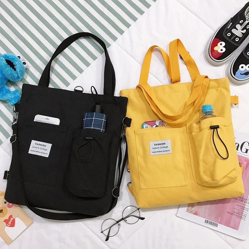 حقيبة يد قماشية بنمط "هاراجوكو" للطلاب مزودة بجيوب، مناسبة للطراز الأكاديمي (Preppy Style)، وتصلح كحقيبة كتف أو حقيبة مدرسية للنساء. - الصورة 6