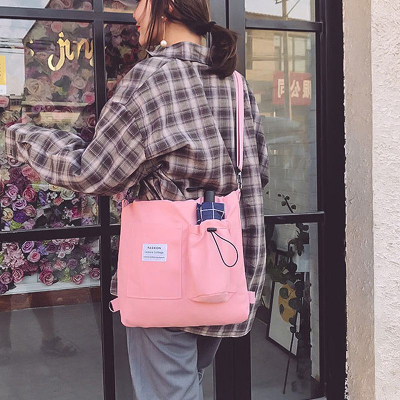 حقيبة يد قماشية بنمط "هاراجوكو" للطلاب مزودة بجيوب، مناسبة للطراز الأكاديمي (Preppy Style)، وتصلح كحقيبة كتف أو حقيبة مدرسية للنساء. - الصورة 4
