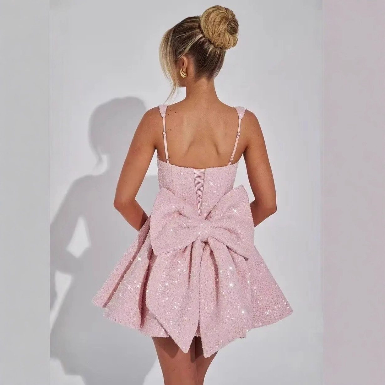 Strapless Sequined Mini Evening Dress With A Bow - Image 2